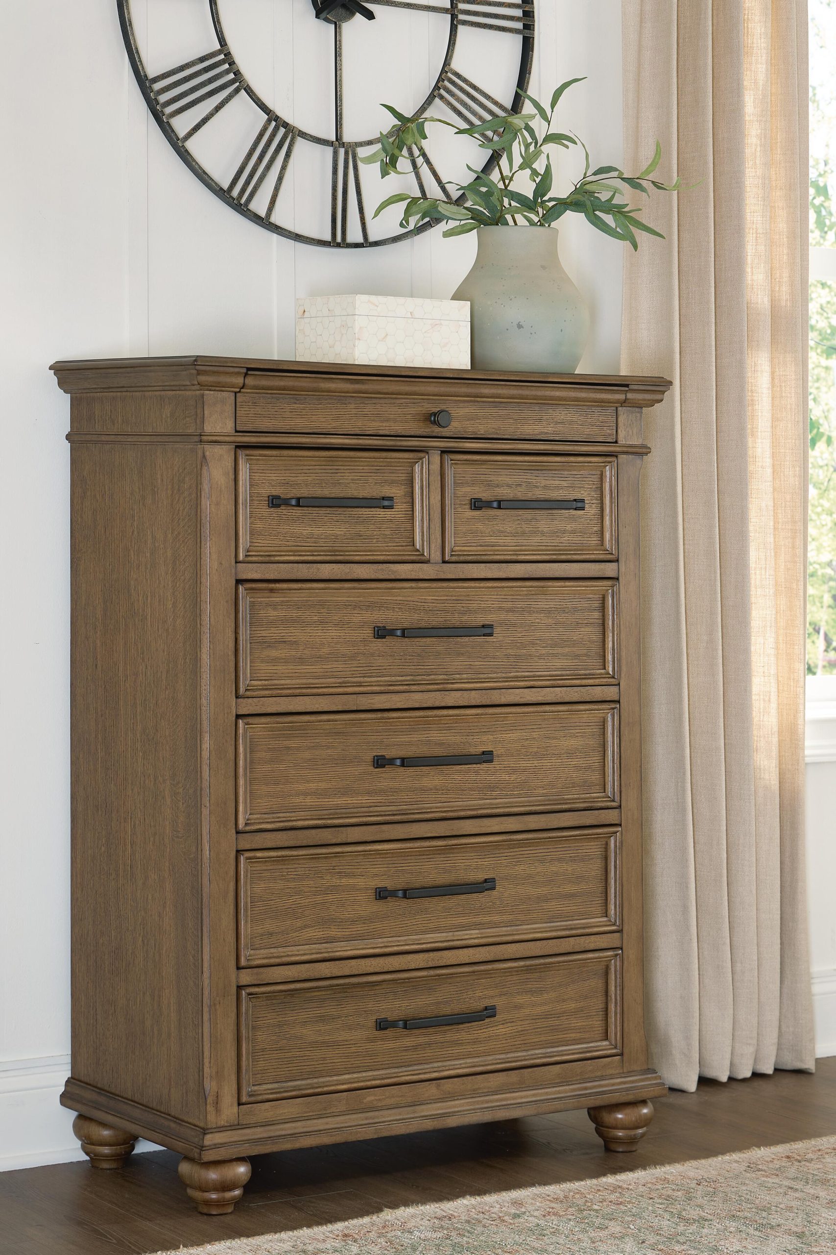 Karallin - Seven Drawer Chest - Medium Brown - Image 2